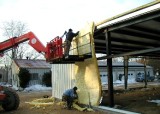 Installing metal siding & insulation